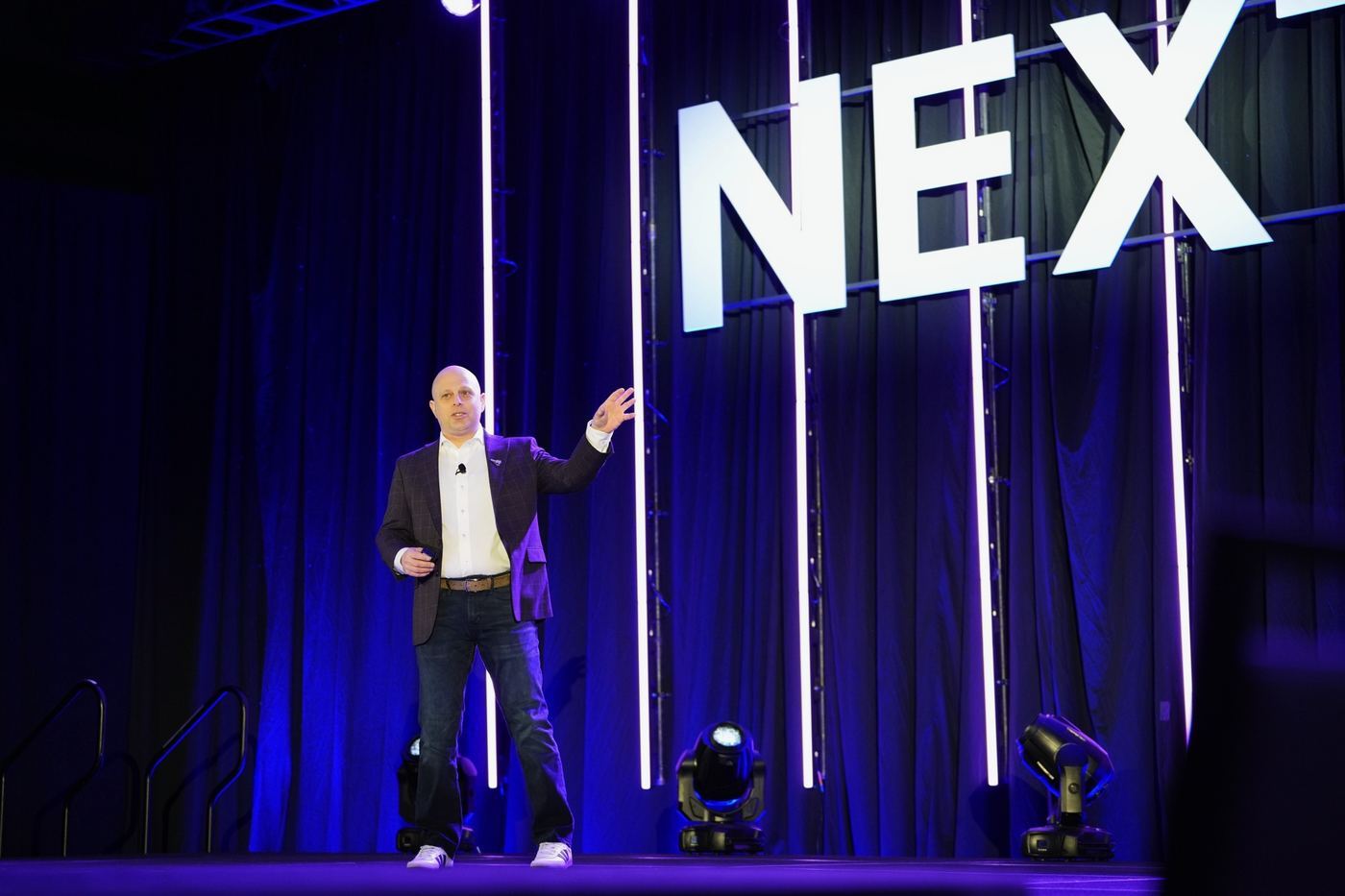 Justin Panzer presenting on stage